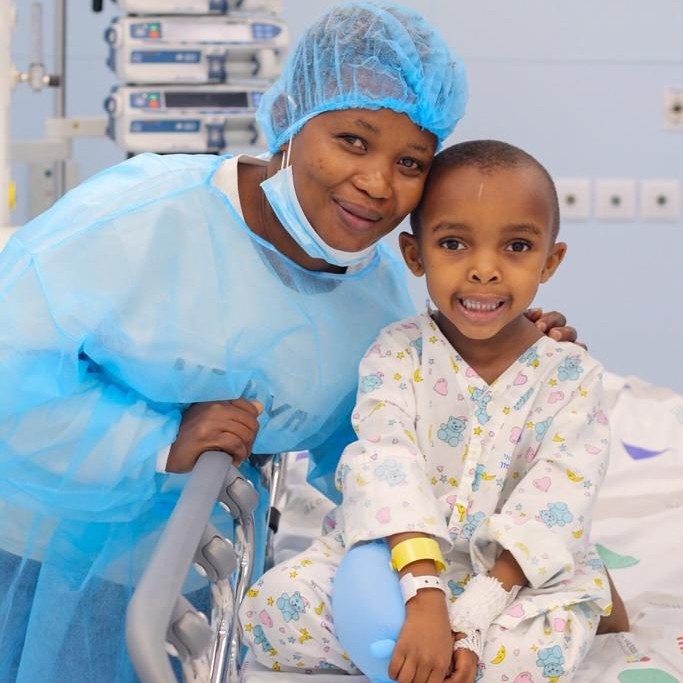 Victoria and her mother after lifesaving heart surgery